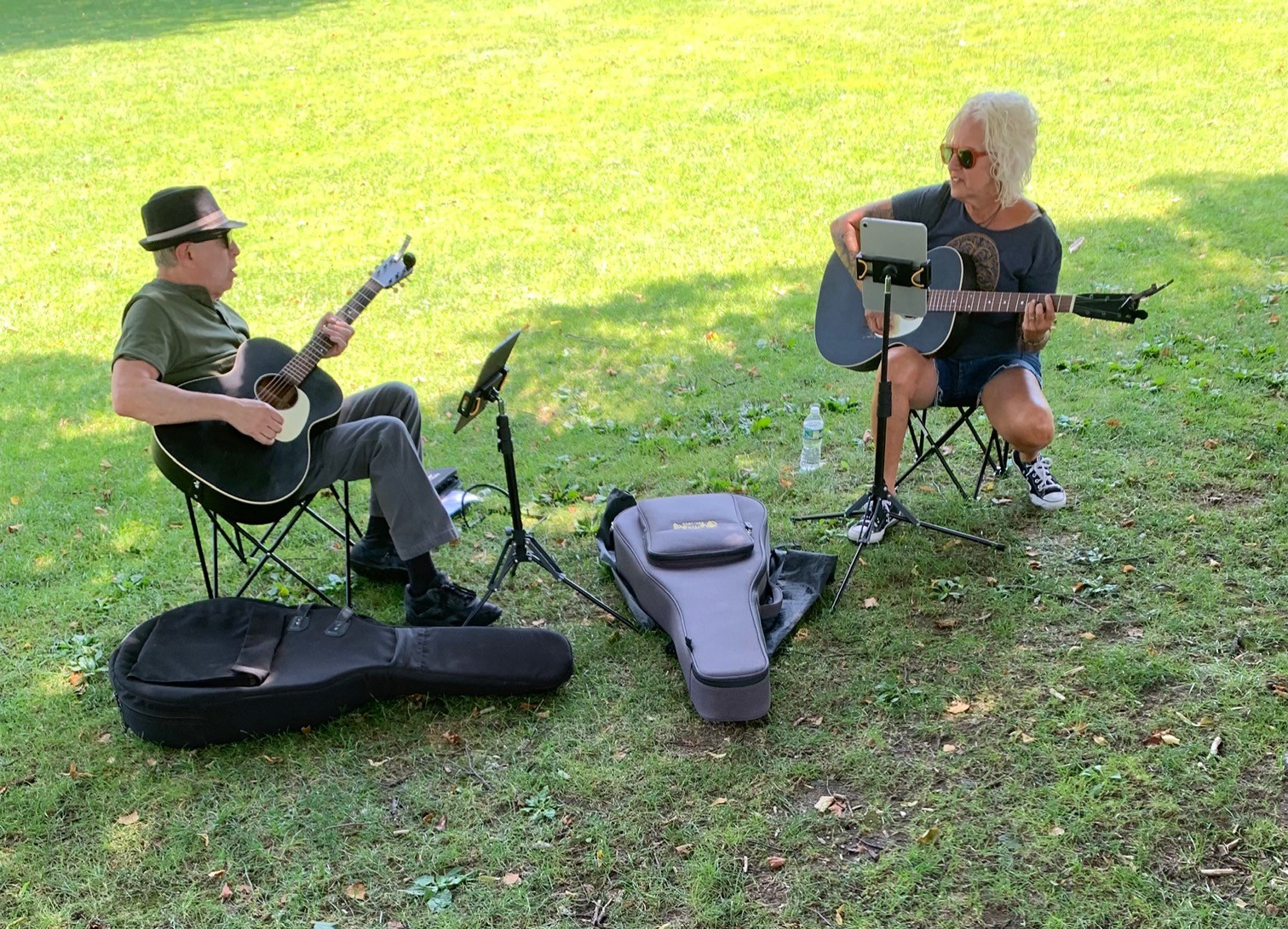 The Stray Tones playing acoustic guitars